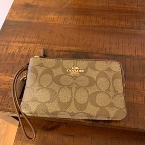 Coach crossbody and wristlet for one price.